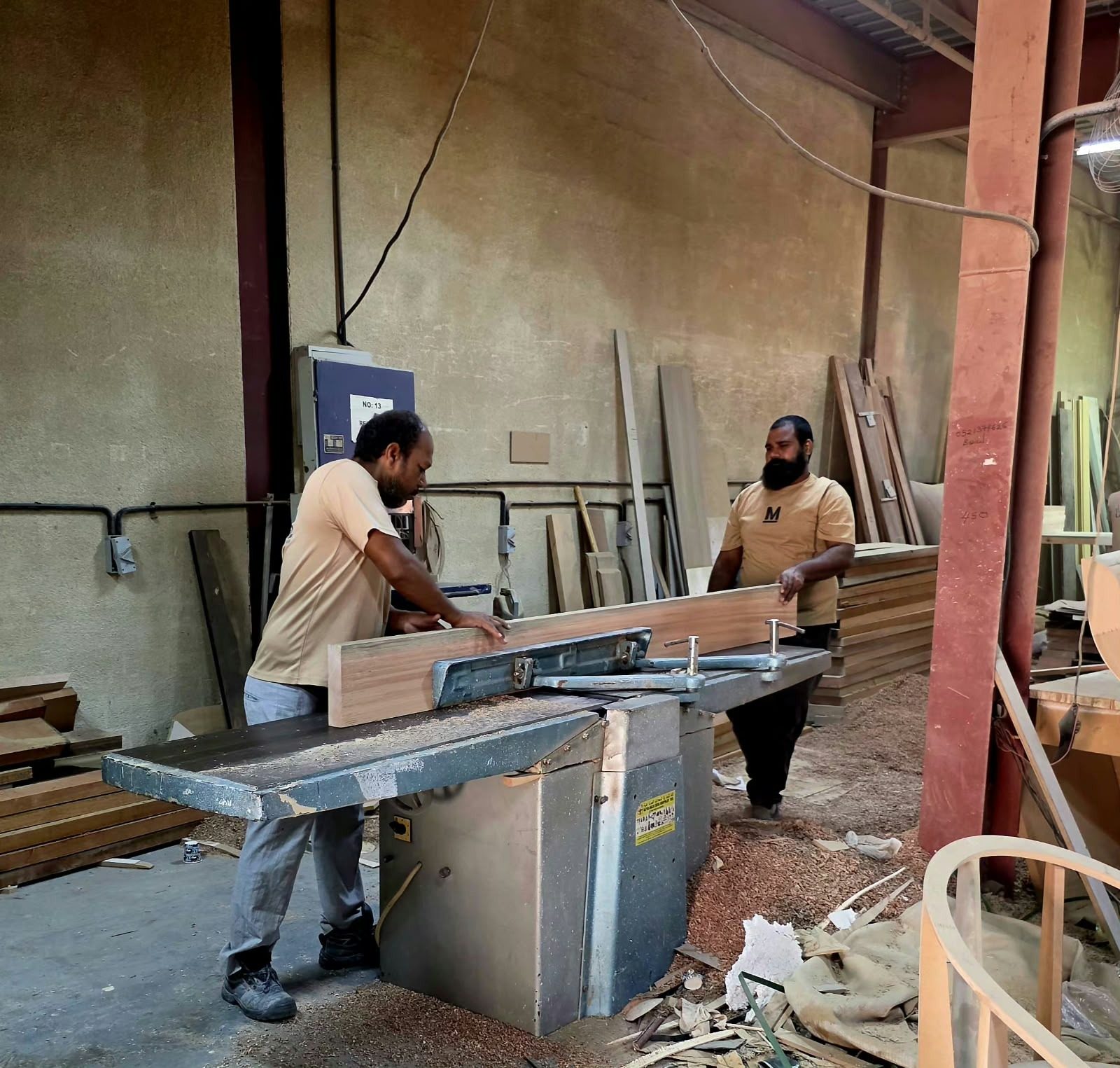 CLARE craftsmen in the Jebel Ali joinery workshop